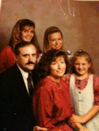 This was my family back in 1992.  I am the cute little one on the right. :)